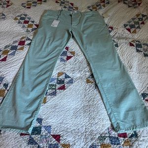Mint color jeans.